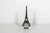 Small gold Eiffel tower souvenir of Paris, France. I believe the metal is brass, but not positive. The base is real...