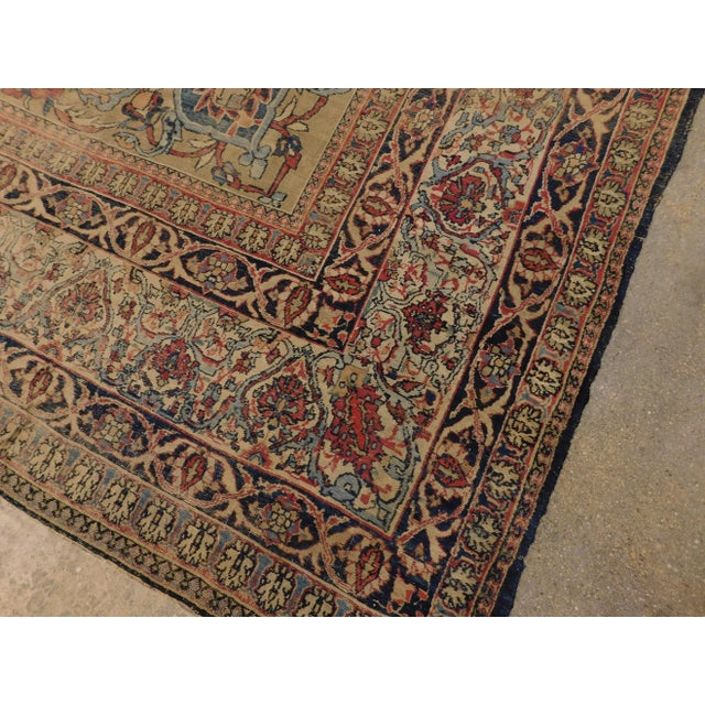 Antique Persian Kerman Lavar. Wool on cotton. Worn low pile. More fading on the lower side of the rug. 8'10"x 11'4"