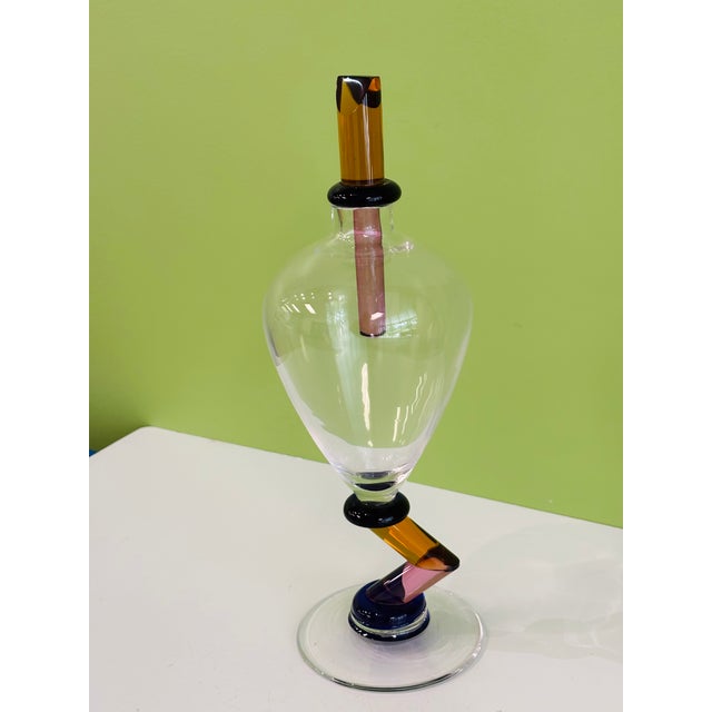 Authentic vintage Murano glass decanters, renowned for their bold shapes and vibrant colors, are highly sought after by...