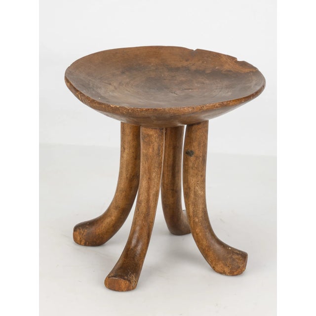 Handcrafted by Karamajong artisans in Uganda, this sculptural headrest stool merges functional design with cultural...