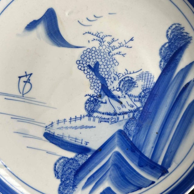 Decorative Arita porcelain plate with blue and white decoration from the early Meiji period (ca 1870). Dimensions: Height...
