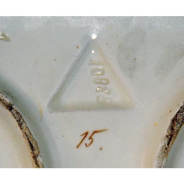 An exquisite 19th century Art Nouveau majolica mirror and basin set, made in France. This beautifully detailed piece...