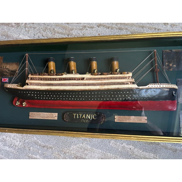 At almost four feet long, this is an imposing commemorative RMR Titanic Diorama with a painted half-hull ship model in the...