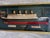 At almost four feet long, this is an imposing commemorative RMR Titanic Diorama with a painted half-hull ship model in the...