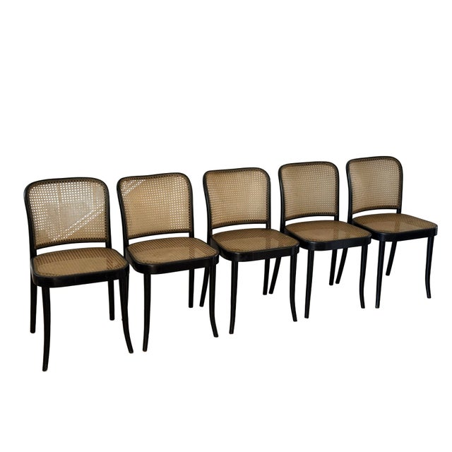 This rare set of 5 Model 811 chairs have hard-to-find pigskin seats that are incredibly durable. One of the chairs...