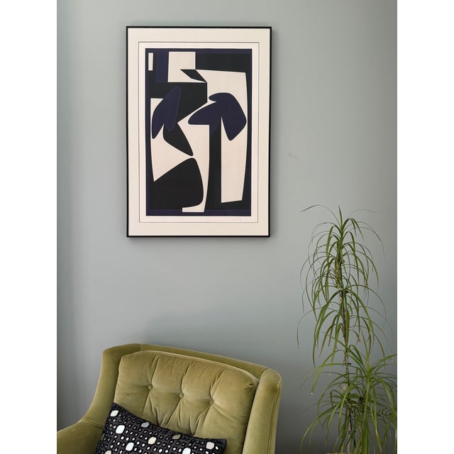 A wonderful example of the work of Victor Vasarely (1906-1997). The abstract image in purple and black contrasts well with...