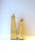 A pair/set of brass Obelisks with ball feet, in the Modern style, circa late 20th century. Pair have a clear lacquer...