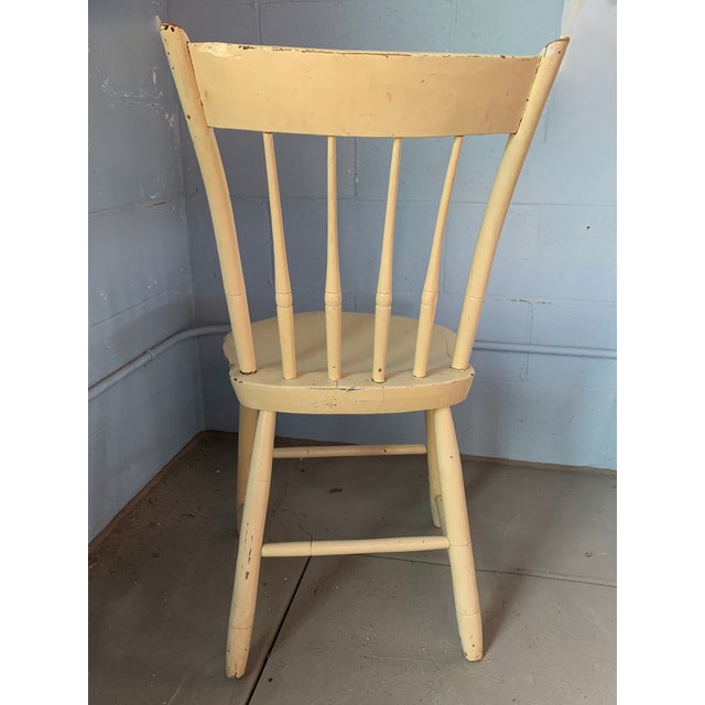 An authentic 19th-century American Country primitive "Spindle-Back" side chair, showcasing exceptional craftsmanship and...
