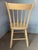 An authentic 19th-century American Country primitive "Spindle-Back" side chair, showcasing exceptional craftsmanship and...