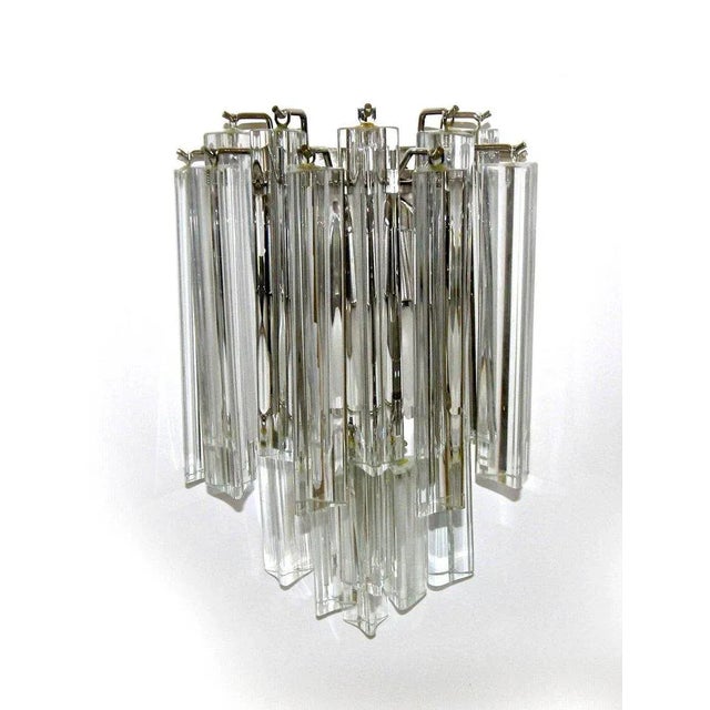 Pair of Venini for Camer glass clear crystal glass Triedi prism wall sconces with chrome-plated back plates. Each sconce...