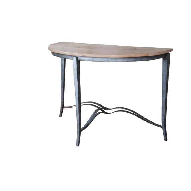 Half Moon maple console table with industrial reclaimed iron base, circa second half 20th century. Features tapered legs...
