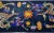Beautiful antique Peking Chinese hand-knotted wool rug with a navy blue field and multi-color accents all-over traditional...