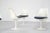 Set of six "Tulip" chairs with white lacquered aluminum bases and fiberglass frames, with original blue fabric cushions....