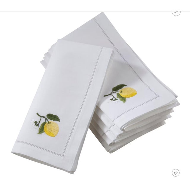 Bring freshness and style to your tabletop with this lovely set of Handmade Lemon Embroidery Napkins. With a delicate,...