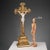 Crucifix in gilded wood, engraved and finely pierced. Figure of Christ in biscuit porcelain. This piece is attributed to...