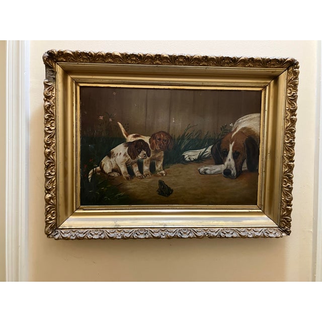 Charming late 19th century, painting of beagle puppies and their mother. The mother is taking a rest and the puppies are...