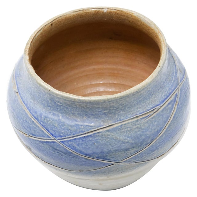 This little planter is perfect size for orchids. Hand-thrown and glazed in a gorgeous blue and white with a silver under...