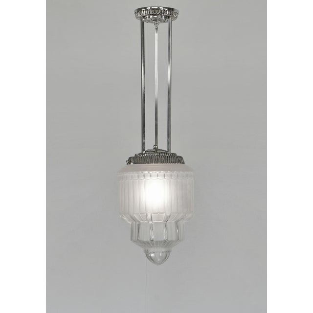 Daum Lorrain A beautiful French 1930 art deco chandelier in nickel plated solid brass or bronze holding a large bowl by...