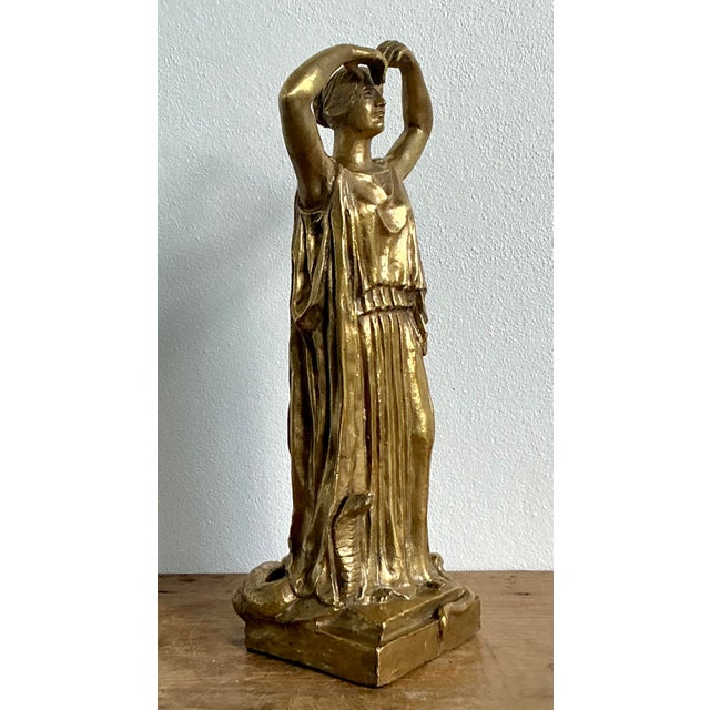 This exquisite late 19th-century Italian bronze sculpture depicts a Peplophoros, a form inspired by classical Greek...