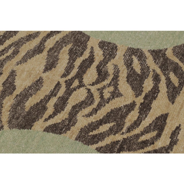 Hand-knotted in wool, this 6x9 rug is a striking new addition to our Distressed Homage collection, inspired by a mid-...