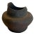 Petite handcrafted clay vase in an ebony tone. Crafted in Brazil, signed by artist on base.