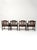 Vintage Colonial Revival game table set featuring a square pedestal table and four matching cane-back armchairs. Turned...