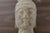 Authentic Northern Wei Dynasty carved stone Buddha head fragment, dating to the 4th-6th century AD. The sculpture displays...