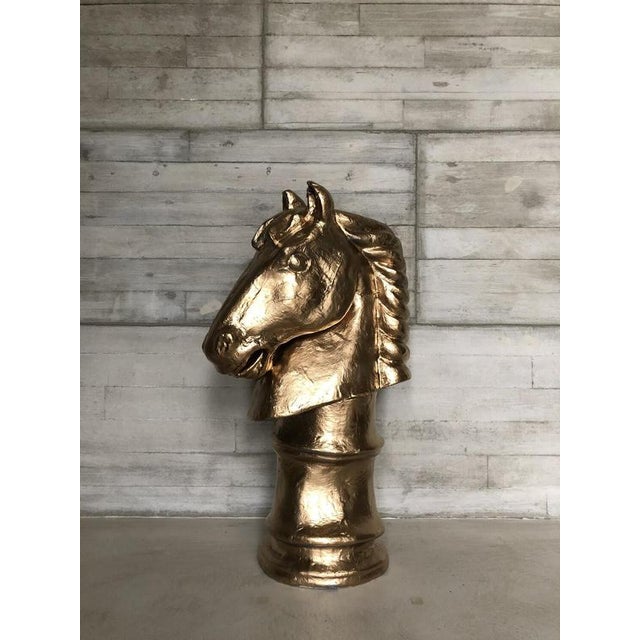 H 95cm w 50cm d 30cm a striking oversized papier-mâché chess knight, handcrafted in the form of a horse’s head and...