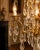 An impressive 1990 French Louis XVI–style table candelabra lamp, crafted from bronze with a gold finish and richly...