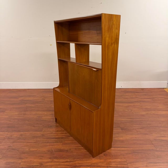 Vintage teak room divider / bar cabinet made in the U.K. circa 1970's by Sutcliffe as part of their S-Form range. It...