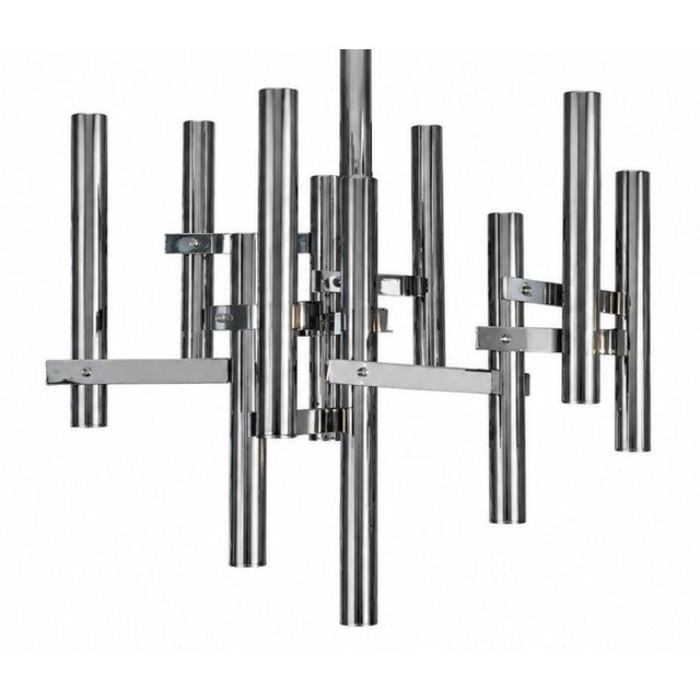 Striking Italian chrome chandelier by Gaetano Sciolari, featuring a sculptural arrangement of vertical polished chrome...