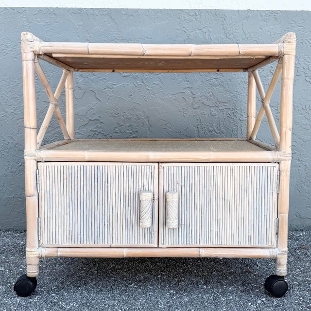 This Boho Chic bar cart showcases a beautifully crafted bamboo frame with a softly white-washed finish that highlights the...