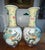 Beautifully scaled pair of large Chinese porcelain vases, hand-painted in the traditional Famille Rose style, featuring...
