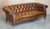 An exceptionally rare and magnificent pair of original early Victorian Howard & Sons (Berners Street) cigar brown leather,...