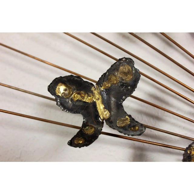 Vintage mid century Brutalist sunburst butterfly metal sculpture wall art hanging by Degroot. This beautiful piece is in...