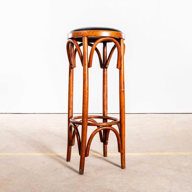 1950’s Original French Upholstered Barstools – Set Of Six. The process of steam bending beech to create elegant chairs was...