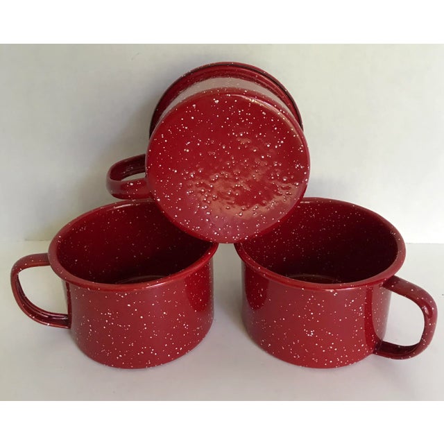 A great set of 3 metal mugs that have the enamel finish with splatters throughout. Gorgeous red color! I'm not sure how...