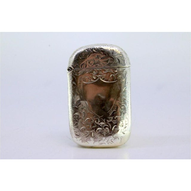 Silver Matchbox with Engraved Plant Motifs and Monogram Card, in Very Good conditions. Designed 1920 to 1949 This piece...