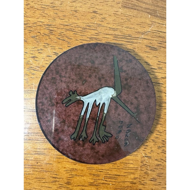 Set of 4 vintage Nazca Peru themed coasters featuring iconic geoglyph designs including the Monkey, Hummingbird, and Dog....