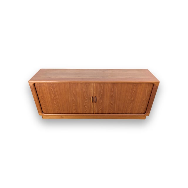 Mid-century sideboard from the renowned Danish manufacturer Dyrlund, dating from the 1960s, for sale. The sideboard...