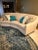 Modern curved sofa that can be altered with a change in pillows. Showpiece when you walk into a room. Modern -...