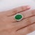 7.50 Carat Untreated Oval Cabochon Cut Green Natural Jadeite Jade with Baguette Diamonds in Platinum 9000 Ballerina Ring....