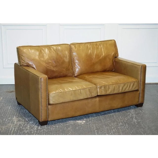 Lovely Timothy Oulton Viscount Tan Two Seater Leather Sofa. This is a very well-made and solid sofa, very comfortable, and...