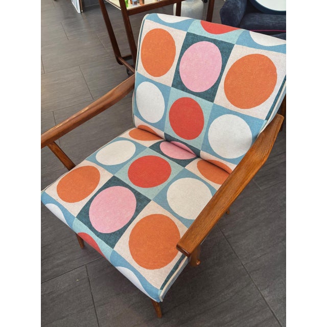 Mid-century armchair Wooden restoration, reupholstered with new fabric, and reupholstered