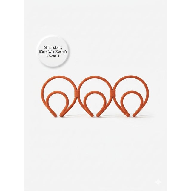 Aluminum tube lined with coral colored cotton fabric