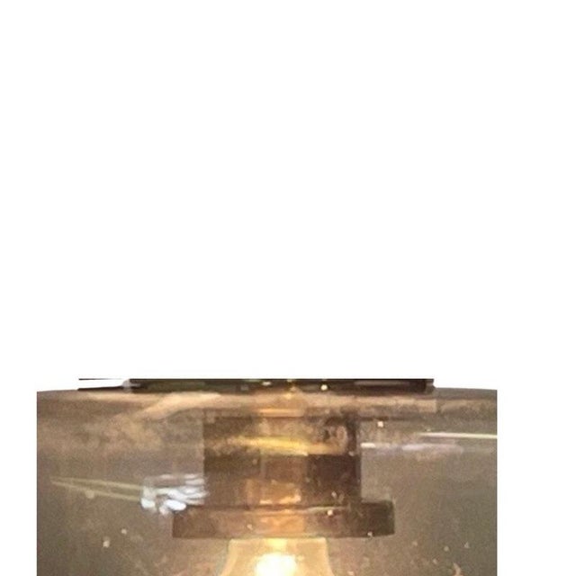 Vintage ceiling mounted lamp by RAAK Amsterdam. A well known and rare example designed. The lamp has its original...