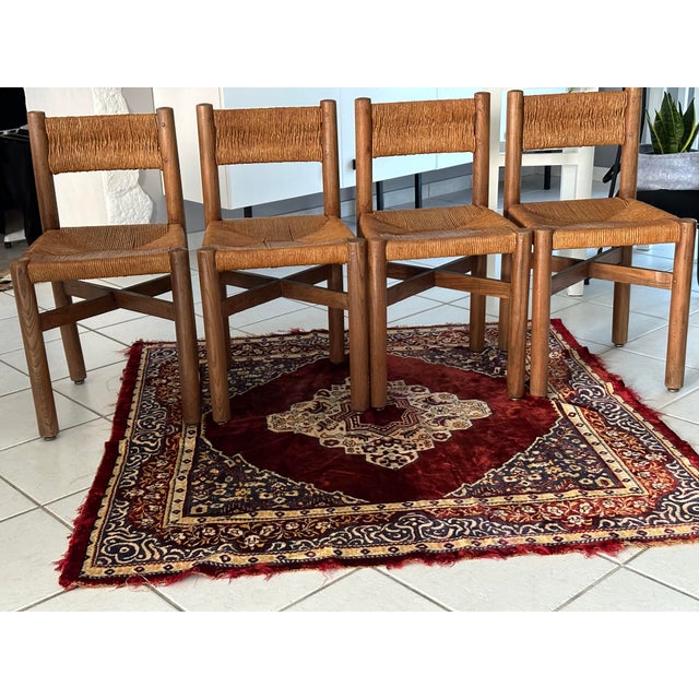 Rare and very beautiful suite of 4 chairs By Charlotte Perriand model Miribel France 1950s. Model designed in the 1950s...