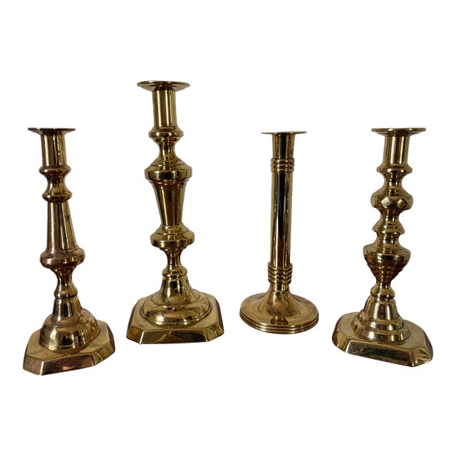 Group of Four English Polished Brass Candlesticks Different Sizes, 19th Century For Sale