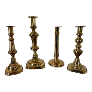 Group of Four English Polished Brass Candlesticks Different Sizes, 19th Century