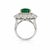 An extraordinary 18K white gold ring showcasing a GIA-certified natural Zambian cushion-cut emerald weighing 7.00 carats,...